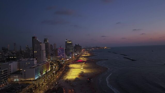Tel Aviv night beach promenade aerial drone view, summer Israel