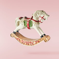 Christmas card. Falling in the air Christmas figurine.