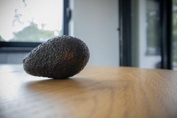 Avocado on a wooden table