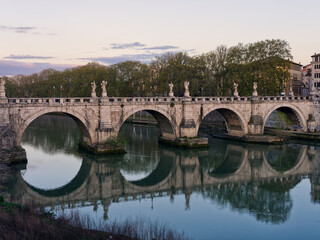 Obraz premium Sant'Angelo bridgereflecting in Tiber, Rome, Italy