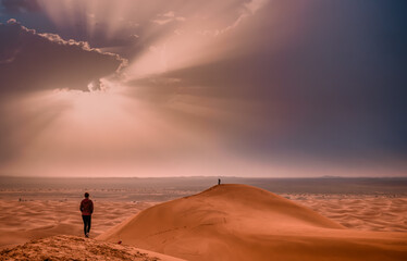 Fototapeta na wymiar sunrise above the Sahara sand dunes
