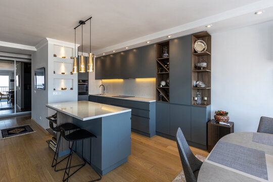 Kitchen and dining interior with kitchen island