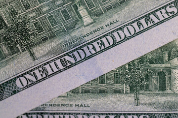 One hundred American dollars close-up, American genuine cash