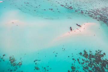 Fototapeta premium Aerial view of clear blue turquoise seawater, Andaman sea in Phuket island in summer season, Thailand. Water in ocean pattern texture wallpaper background.