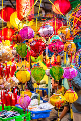 Ho Chi Minh City, Vietnam - September 22nd, 2023: Colorful tradition lantern at chinatown market. Many kind of Chinese lanterns hanging on street market in mid autumn festival.