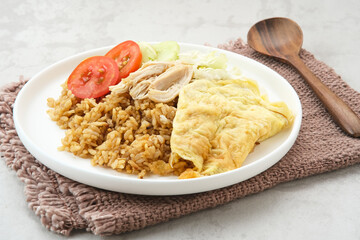 Nasi Goreng Telur Dadar, popular traditional Indonesian street food
