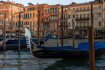 Fototapeta na wymiar View of Grand Canal Venice at sunset, with gondola, Venice Italy, selective focus