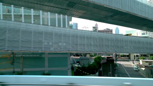 Ride through Tokyo on the Yurikamome monorail in Minato, Tokyo, Japan