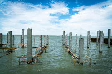 Piles run along the edge of the sea to create a viewpoint.