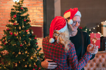 Photo of young couple dancing on New Year's Eve