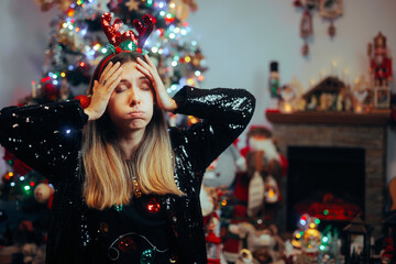 Woman Forgetting Something Important for Christmas Celebration. Lonely girl suffering from seasonal...