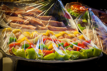 foods that are wrapped with plastic wrap.