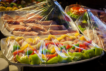 foods that are wrapped with plastic wrap.