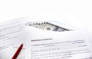 Close-up view, business contract and work document with dollar in white envelope and pen on desk....