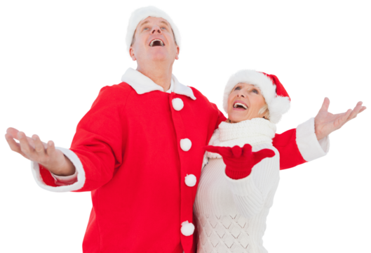 Digital png photo of senior caucasian couple with santa hats on transparent background - Powered by Adobe
