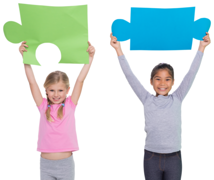 Digital png photo of diverse girls holing puzzle pieces with copy space on transparent background