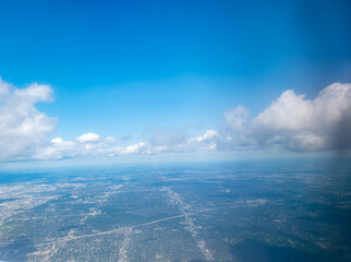 View of Toronto, Ontario from an airplane on a partly cloudy day