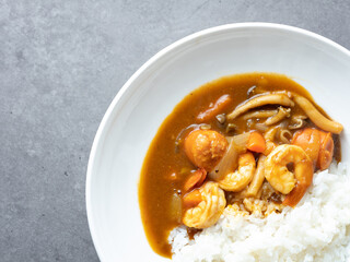 Shrimp and vegetable curry rice on a plate