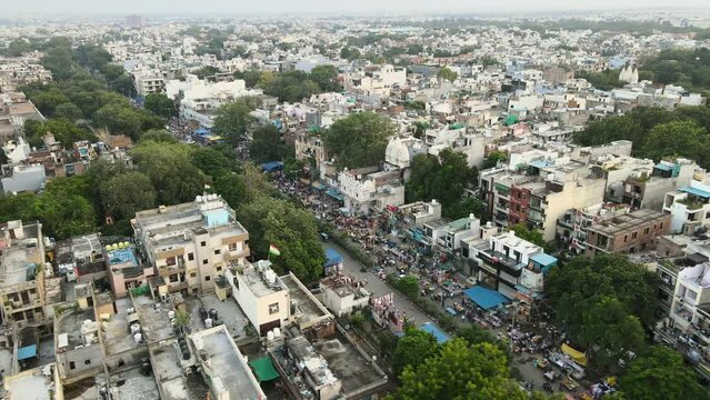 4K Aerial Shots of New Delhi Residential Suburbs on a beautiful day gliding over Rooftops, streets, parks and markets in India