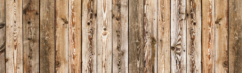 Panoramic wood texture. Brown wooden wall background. Rustic desks with knots pattern. Countryside...