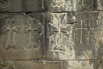Cross on the wall of church.