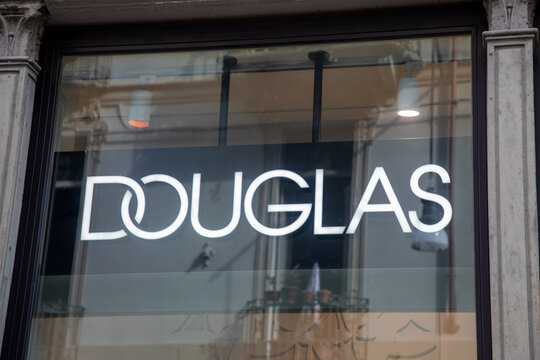 douglas sign text and brand logo on wall shop german boutique chain of perfumery fashion cosmetics store
