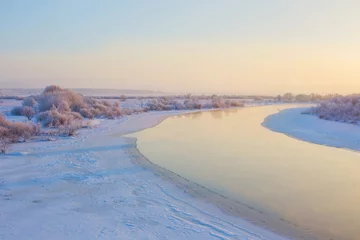 Fototapeten beautiful winter landscape with river © Maya Kruchancova
