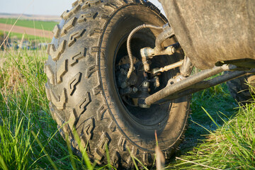 ATV wheel close-up,mechanism for connecting a wheel on a quad bike, a wheel on a hub with a brake...