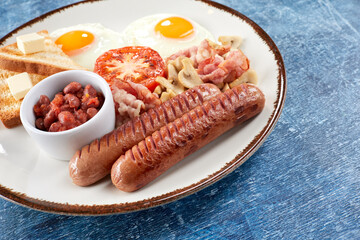 traditional breakfast with beans and sausage