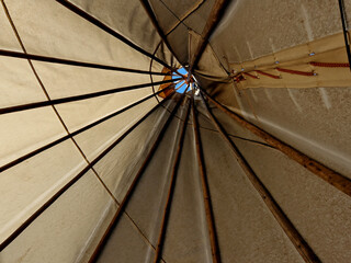 the teepee tent is equipped on the inside with furniture for groups of children in kindergarten....