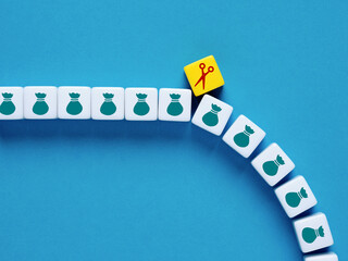 Budget cut. Reducing costs. Cost optimization. Cutting wage expenses. Inflation, economic crisis...