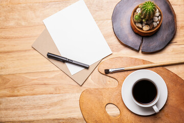 Coffee with Croissant note pad Coloring plate on wooden table