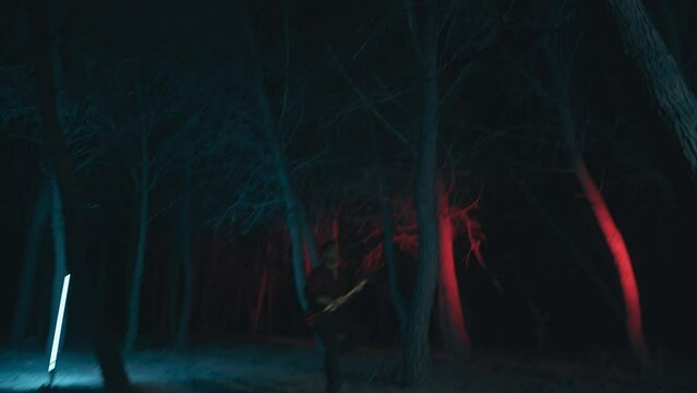 Maniac Man With Axe Chase Victims In The Night Halloween Forest