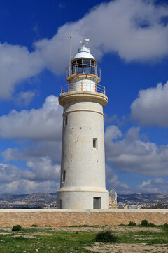 Vertical photo of Paphos Lighthouse, a well known lighthouse on the island of Cyprus, near to the city of Paphos.