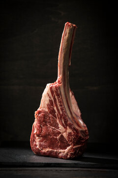 Raw tomahawk steak