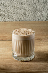 cup of cappuccino on wooden table