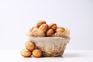 Nut cookies in a flying bowl on a white background