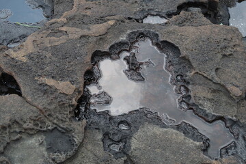 hardened volcanic lava on the coast