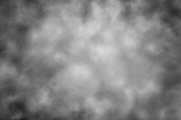 An abstract gray background in the form of a swirling fog.