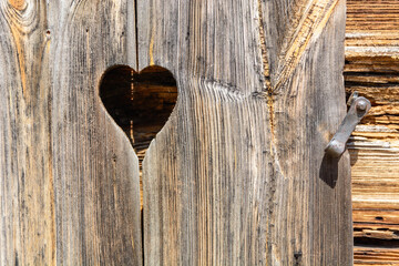 heart and old brown rustic dark grunge wooden texture - wood Background banner.
