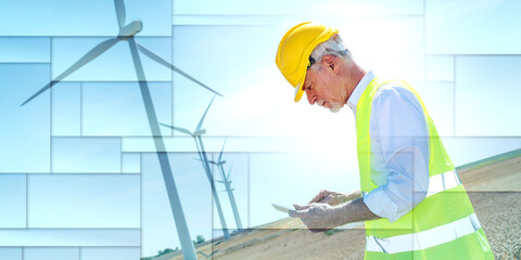 Engineer using digital tablet for wind turbine inspection, geometric pattern