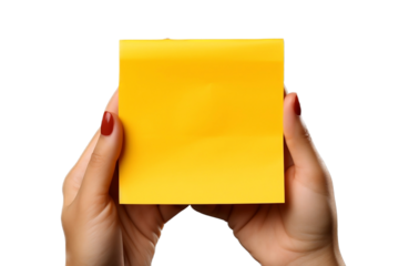 hand holding a yellow note