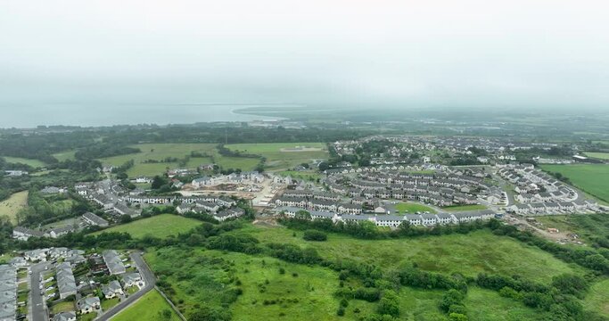 Panoramic bird's eye view of the misty town of Wexford, Ireland 4k