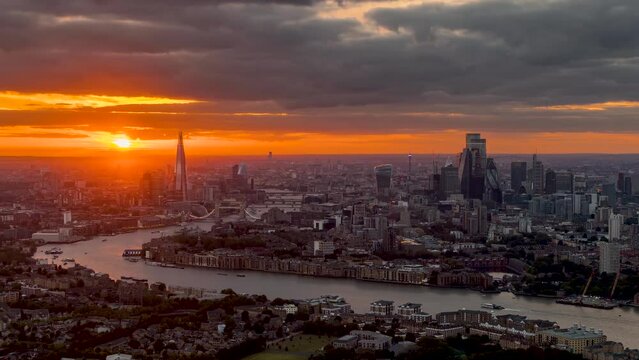 Wide panoramic sunset to night time lapse view of the urban skyline of London, United Kingdom