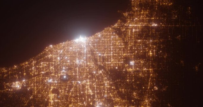 Chicago (Illinois, USA) top view at night. Aerial view on modern city from space. Camera is flying above the city, moving forward. Vertical video. The north is on the left side