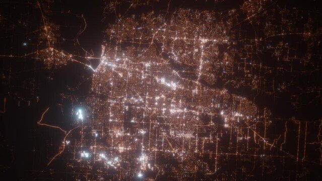 Memphis (Tennessee, USA) aerial view at night. Top view on modern city with street lights. Camera is zooming out, rotating clockwise