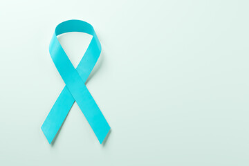Realistic blue ribbon, world prostate cancer day symbol in november.