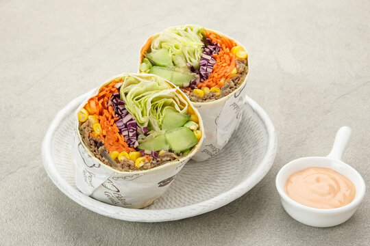 Salad Wrap. Tortilla Wraps With Beef Teriyaki And Fresh Vegetables. Served With Mayonnaise Sauce
