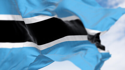 Close-up of Botswana national flag waving on a clear day