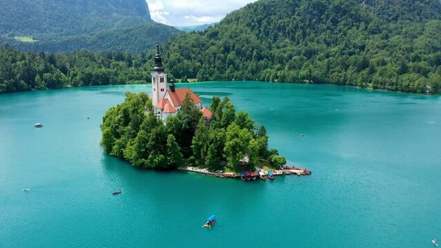 Lake Bled in Slovenia. Beautiful mountains and Bled lake with small Pilgrimage Church. Bled lake and island with Pilgrimage Church of the Assumption of Maria. Bled, Slovenia, Europe.